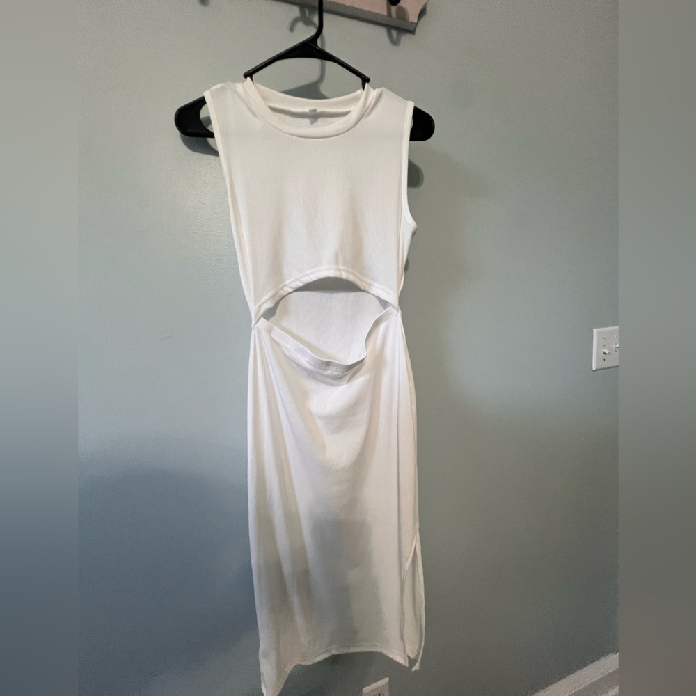 White figure hugging dress. Never worn. Purchased for a bridal shoot.